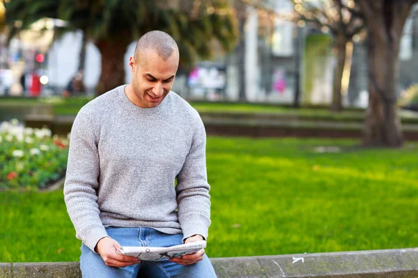 Young Man Reading Newspaper — Stock Photo, Image