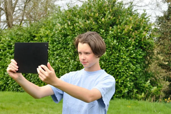 Girl using digital tablet — Stock Photo, Image
