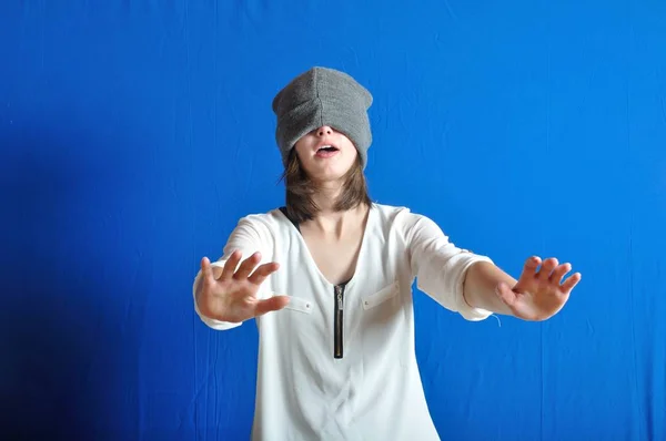 Teen hiding his face with his bonnet. — Stock Photo, Image