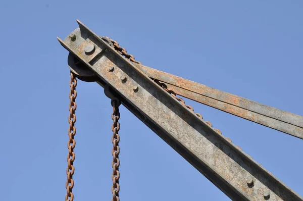 Crane pulley in the sky — Stock Photo, Image