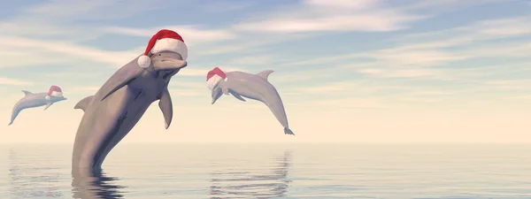 Dolphins celebrating christmas in the ocean - 3D render — Stock Photo, Image