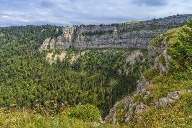 Famous cliff Creux du Van at Neuchatel, Switzerland, HDR clipart