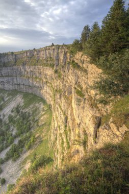 Famous cliff Creux du Van at Neuchatel, Switzerland clipart