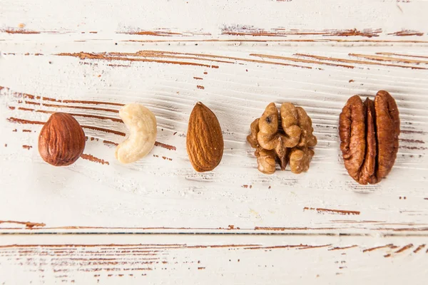 Mix of different nuts closeup photo — Stock Photo, Image