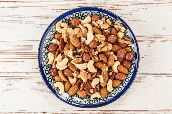 Mix of different nuts closeup photo — Stock Photo, Image