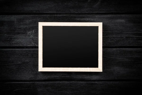 Moldura de imagem em uma parede cinza — Fotografia de Stock