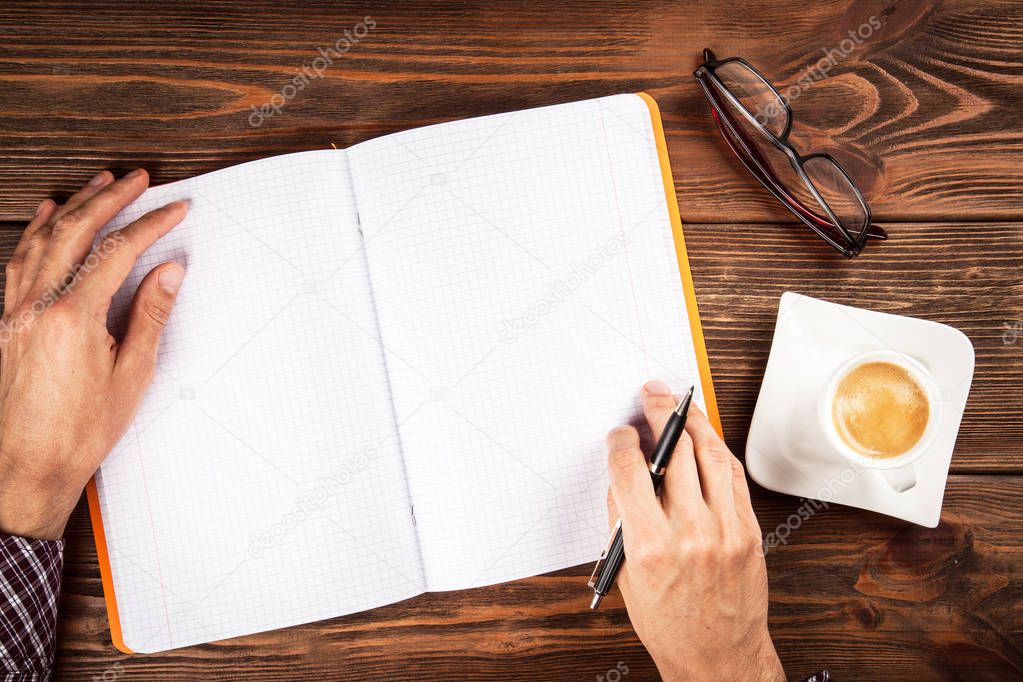 Copybook on a wooden table