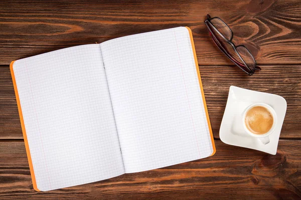 Copybook on a wooden table — Stock Photo, Image