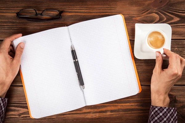 Copybook on a wooden table — Stock Photo, Image