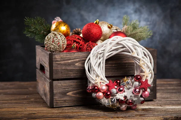 Christmas ornaments in a wooden crate