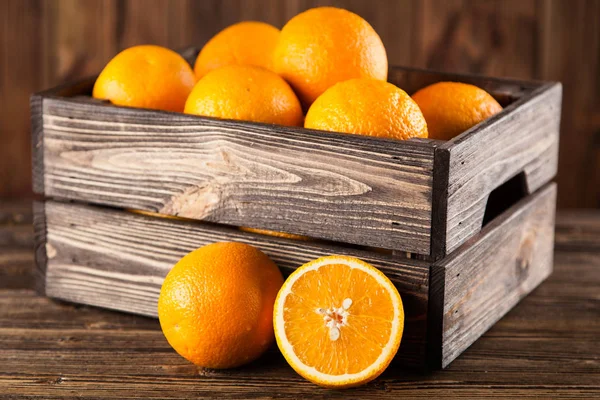 Fresh oranges in a crate — Stock Photo, Image