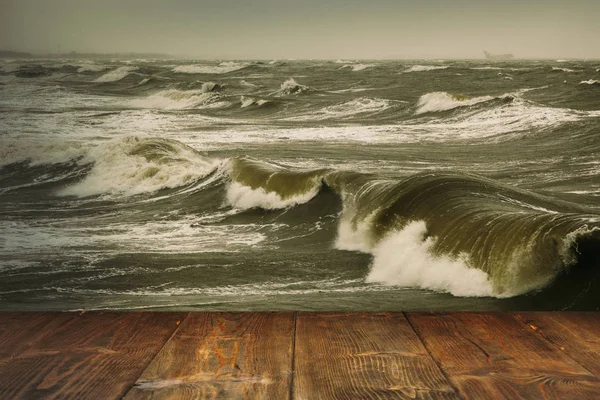 Table on stormy sea background — Stock Photo, Image