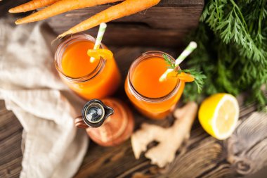 Fresh organic carrot juice clipart