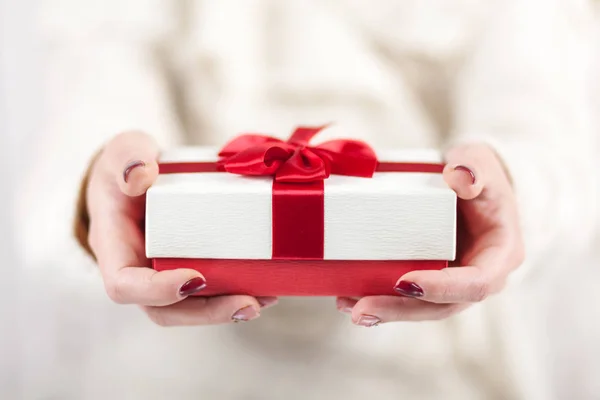 Present box in womans hands — Stock Photo, Image