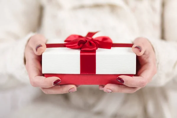 Present box in womans hands — Stock Photo, Image