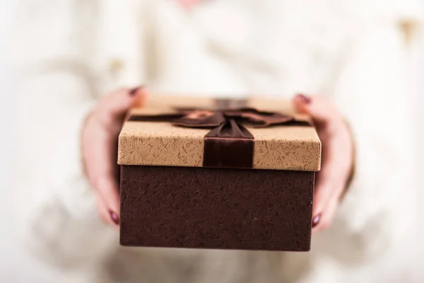 Present box in womans hands — Stock Photo, Image