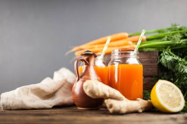 Fresh organic carrot juice clipart