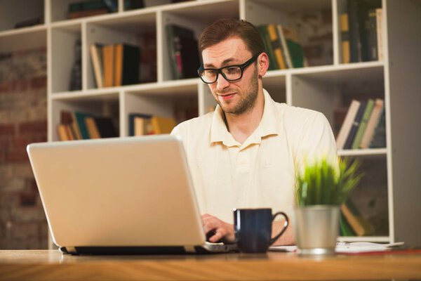 Young man with a laptop