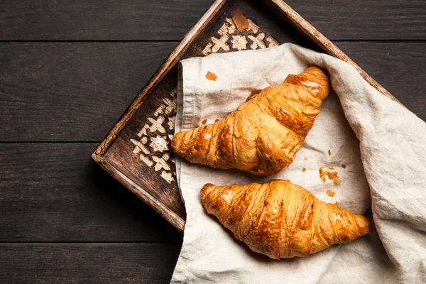 Máslo čerstvé croissanty — Stock fotografie