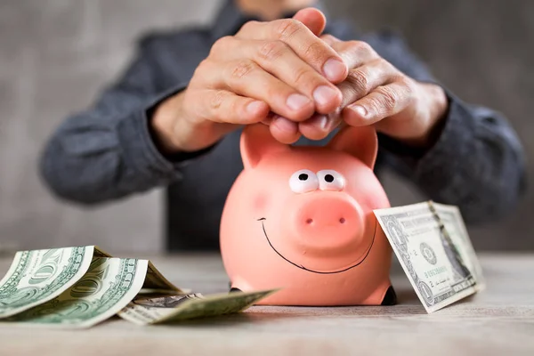 Piggy bank on grey background — Stock Photo, Image