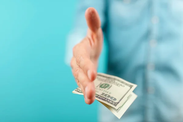 Man giving a hundred dollar bill — Stock Photo, Image