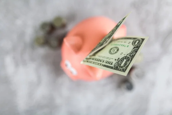 Piggy bank on grey background — Stock Photo, Image