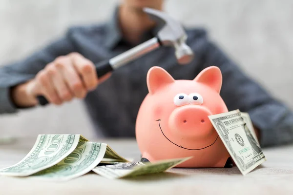 Man holding a piggy bank — Stock Photo, Image