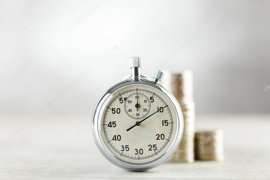 Analog stopwatch on grey background