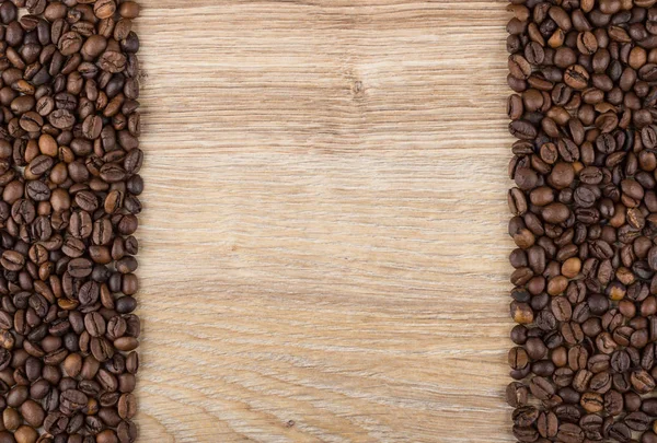 Background from wooden table and coffee beans