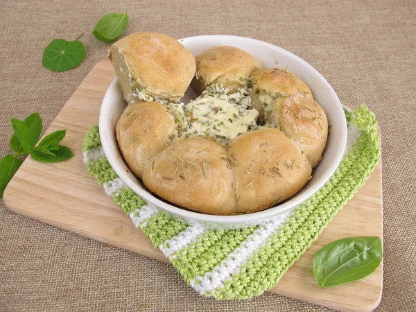 Bun ring filled with herb cream cheese — Stock Photo, Image