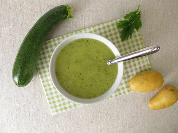 Homemade green soup with zucchini and potatoes
