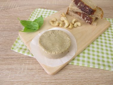 Homemade vegan cheese from cashews and bread clipart