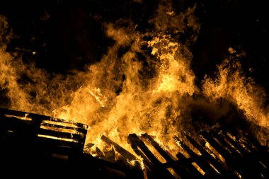 Bonfire in Iceland on new years eve, a tradtional celebration of the passing year and coming of the new clipart