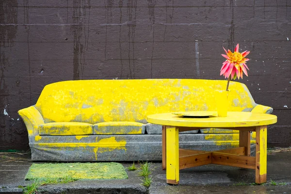 Old sofa painted yellow