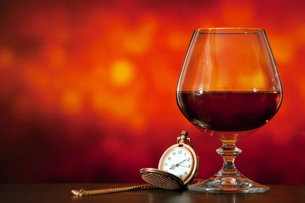 Brandy verre et montre de poche — Photo