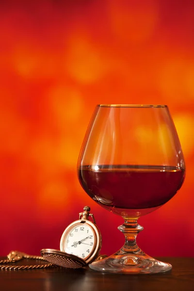 Brandy verre et montre de poche — Photo