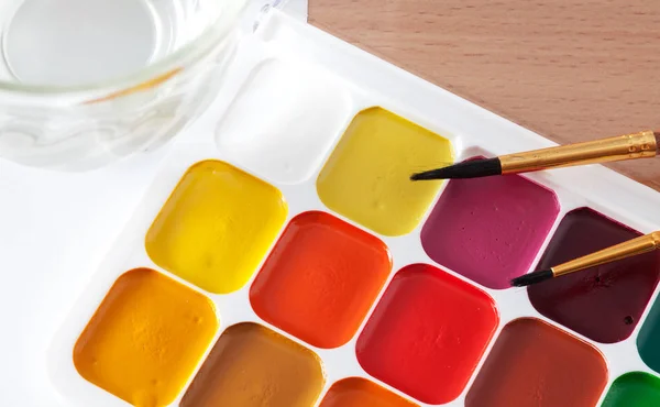 Colored paints on the table — Stock Photo, Image