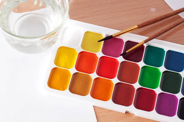 Colored paints on the table — Stock Photo, Image