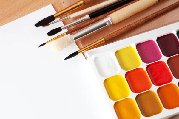 Colored paints on the table — Stock Photo, Image