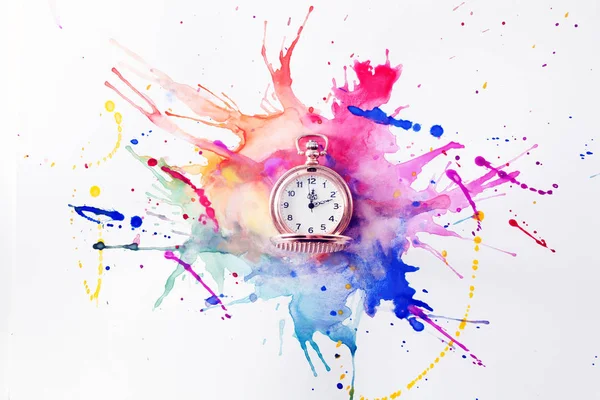 Pocket watch on the paint — Stock Photo, Image
