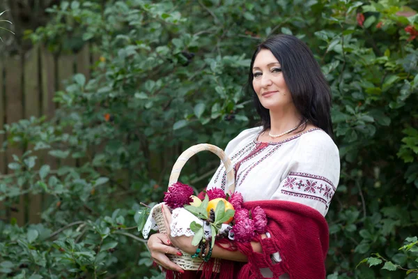 Woman with basket — Stock Photo, Image