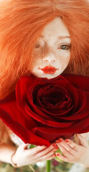 Doll and flower — Stock Photo, Image