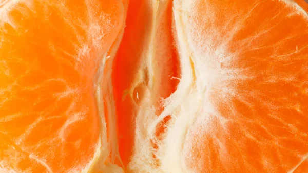 Laranja suculento maduro mandarina fatias close-up — Fotografia de Stock