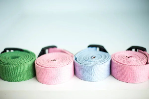 colorful belts in yoga room