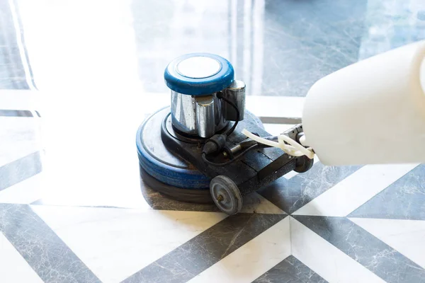 Working polisher on marble floor — Stock Photo, Image