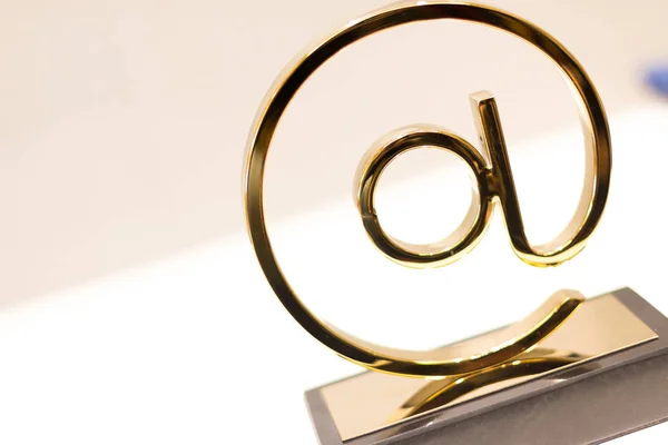 Golden email sign on table — Stock Photo, Image