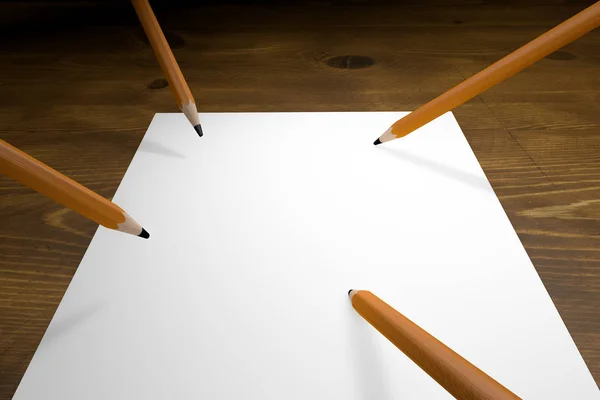 Lápices con papel blanco sobre mesa de madera — Foto de Stock