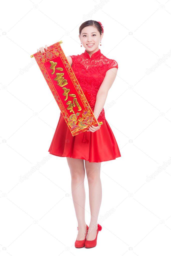 woman holds red couplet in chinese new year