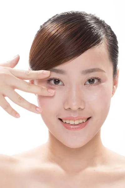 Maquillage facial de belle femme asiatique — Photo