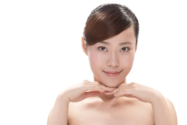 Ansigtsbehandling makeup af asiatisk smuk kvinde - Stock-foto